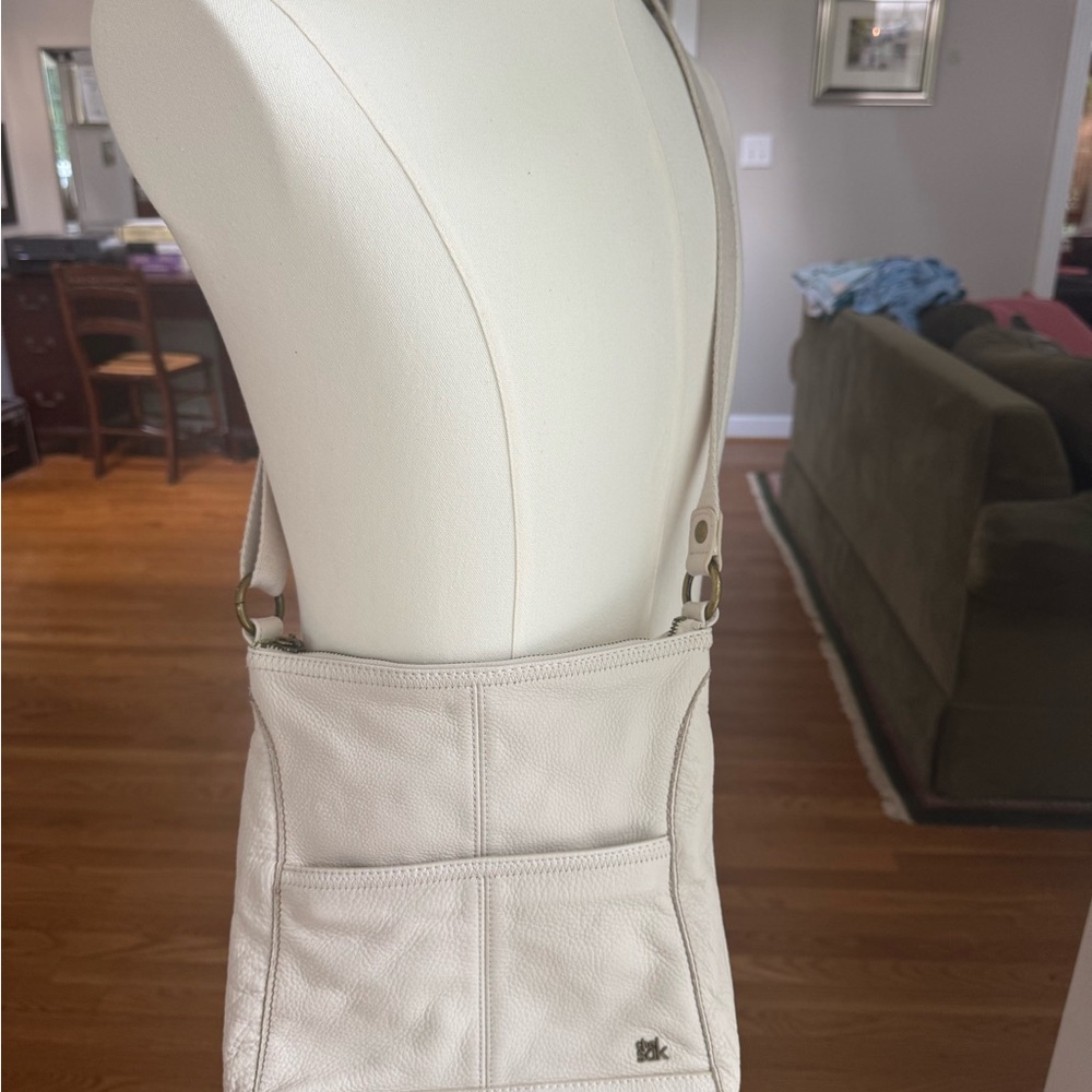 The Sak Cream iris crossbody ivory handbag